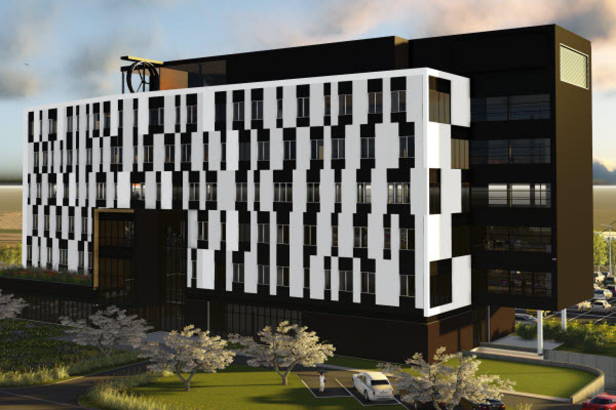 Un immeuble de bureaux vert foncé à Saint-Hyacinthe