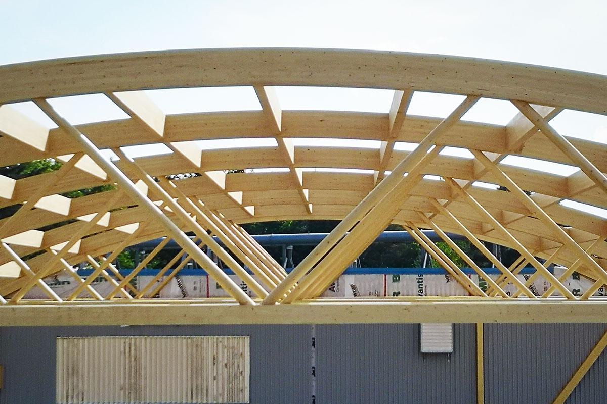 Art Massif se spécialise dans la fabrication de structures de bois lamellé-collé et assemblées à l’aide du connecteur à tiges collées- Image de Art Massif Structure de bois